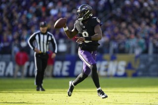 Lamar Jackson s perfect day clinches top seed in AFC for Ravens